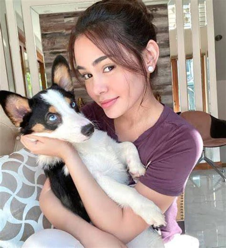 Alawi with her pet dog
