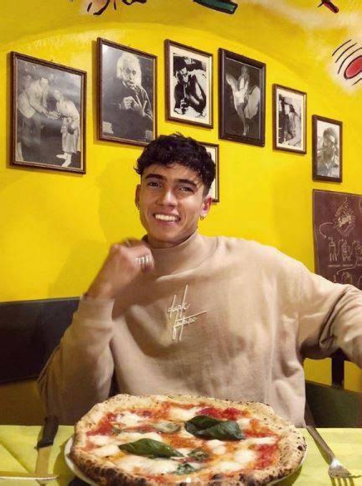 Cam Holmes loves pizza