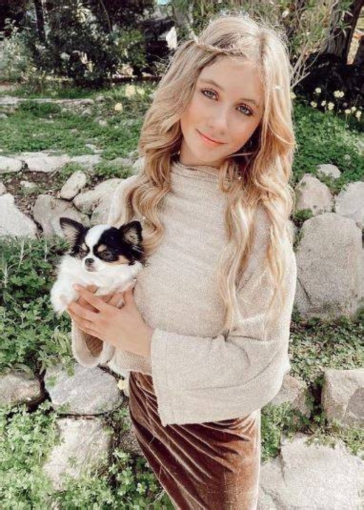 Elliana with her pet dog Lola