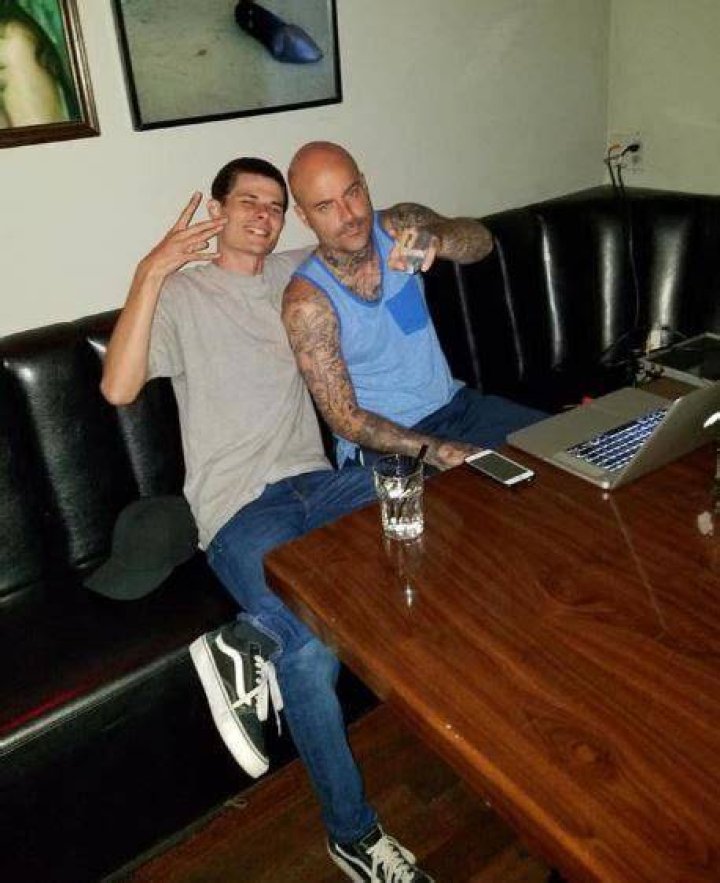 Emmet Flores with his son