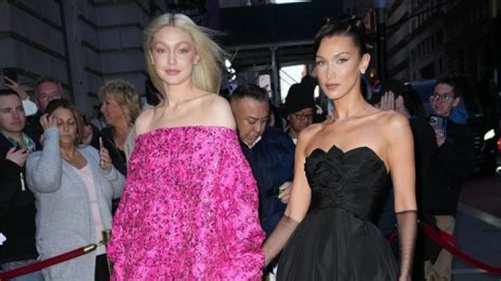 Hadid with his sisters and mother