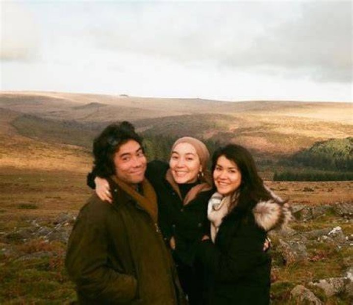 Hana Tajima with her siblings