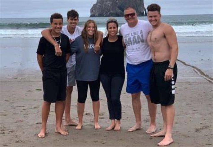 Jennifer Kitna with her son Jalen and husband Jon Kitna