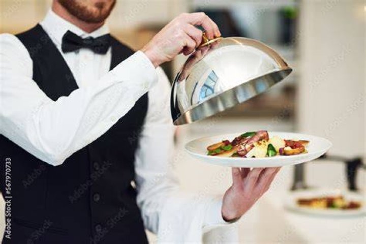 Man Serving Moroccan Food