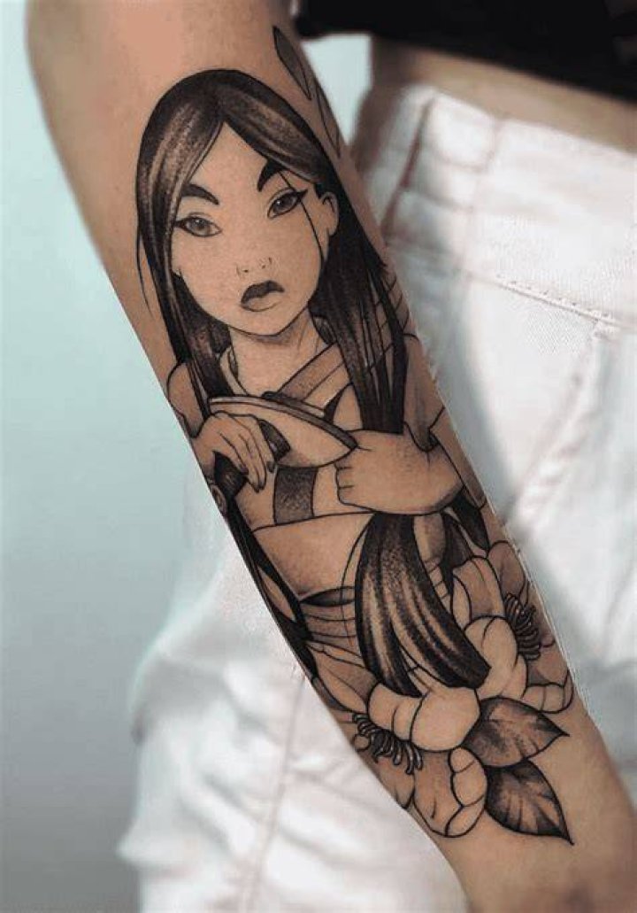 Mulan Vuitton hand tattoo