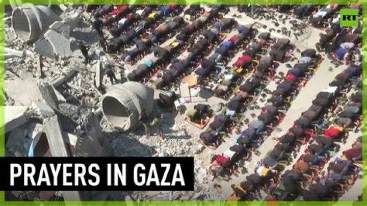 Palestinians Pray Despite Airstrikes