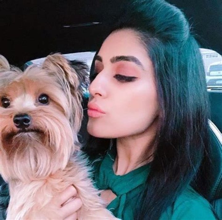 Reena with her pet dog