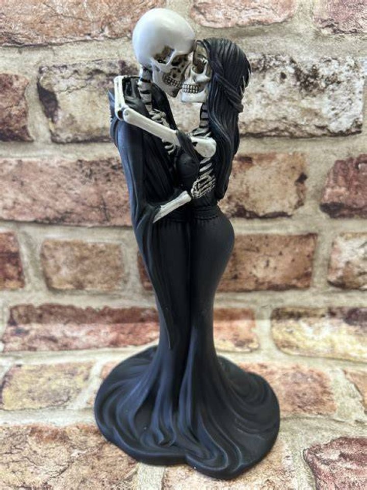 Skeletons Locked In An Eternal Kiss