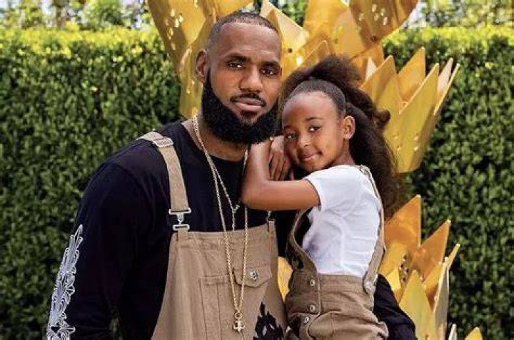 Zhuri James with her elder brothers